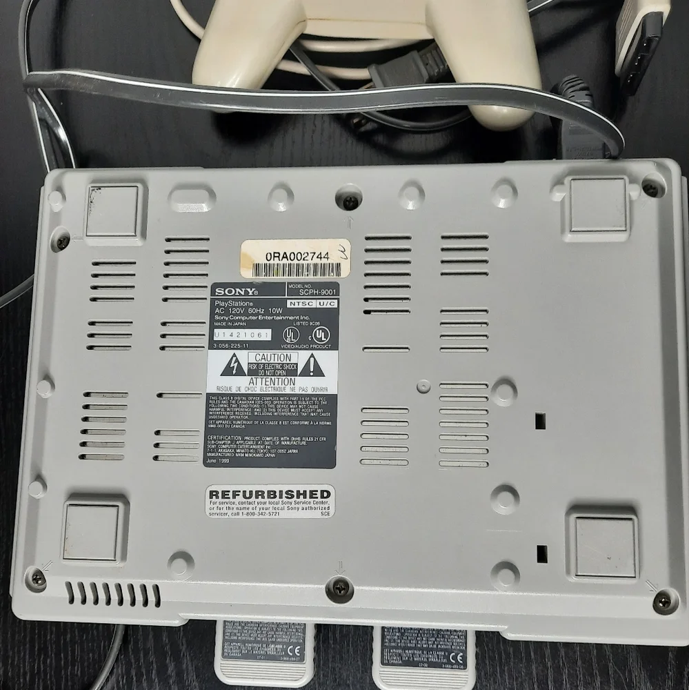 Playstation 1 Console with 2 memory cards and a controller